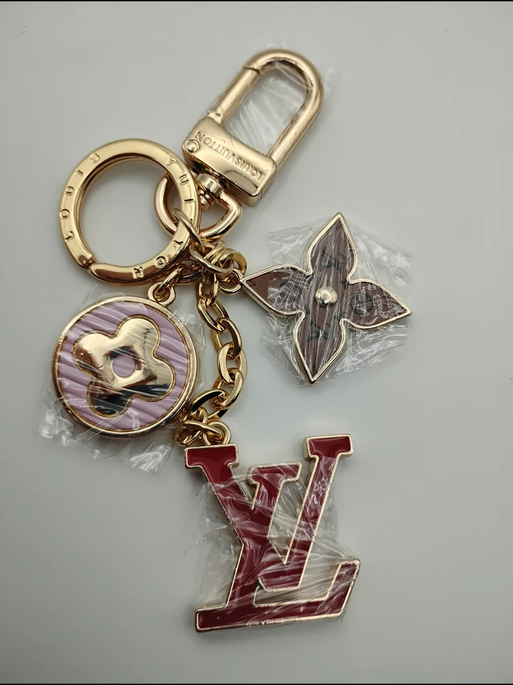 Louis Vuitton Red & Gold-Tone Keychain Charm With Pink and Brown Accents BNWOT